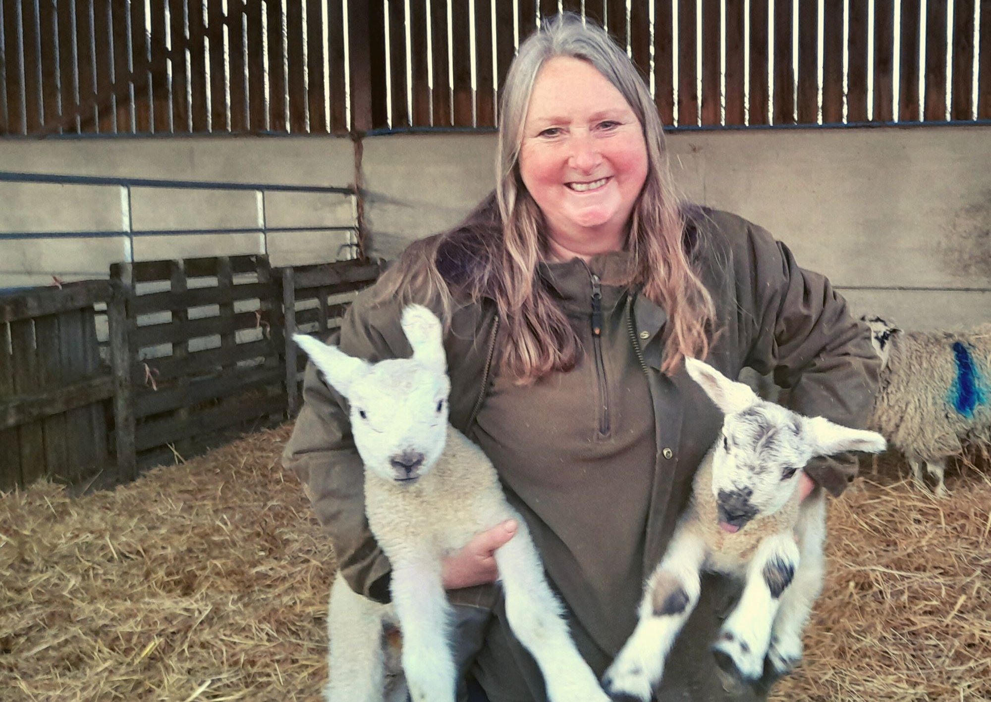 Jane Parlour on her North Yorkshire farm with lambs.