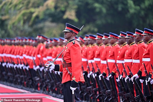 Members of the Guard of Honour prepare for the arrival at the State House in Nairobi today