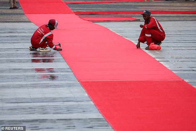 The red carpet is prepared for the King and Queen at the Uhuru Gardens in Nairobi today