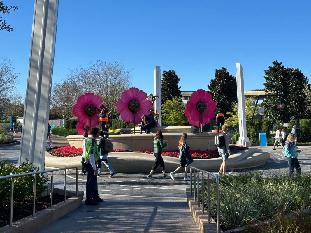 Crew members at flowers and Figment topiary