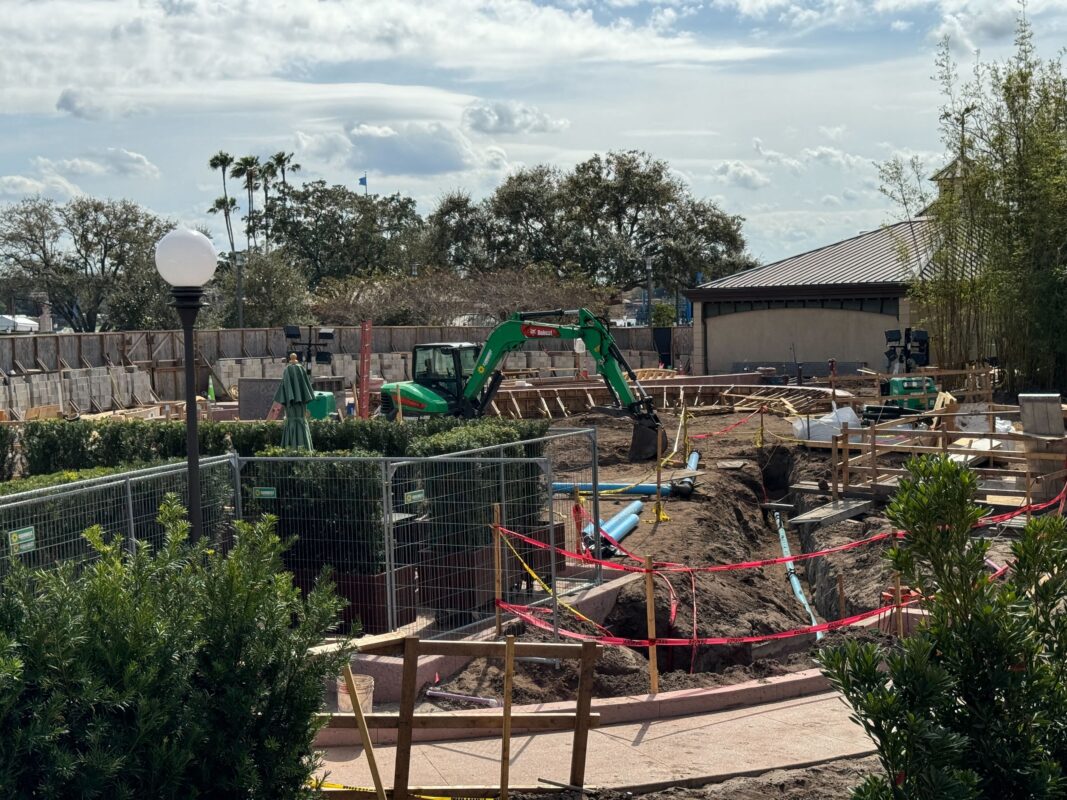 PHOTOS: 2024 Flower & Garden Festival Booth Installed Behind Construction Walls at EPCOT Flex Space 7 Digger in the EPCOT flex space construction site
